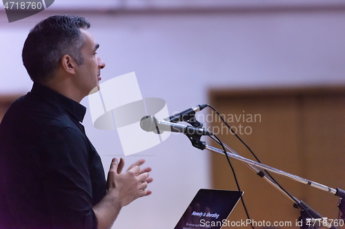 Image of businessman giving presentations at conference room