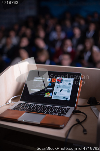 Image of laptop computer at podium