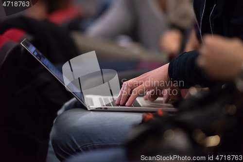 Image of business people hands using laptop computer