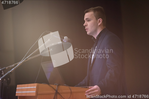 Image of businessman giving presentations at conference room