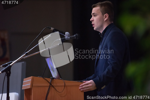 Image of businessman giving presentations at conference room