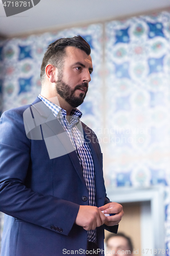 Image of businessman giving presentations at conference room