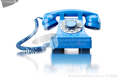 Image of old turquoise dial-up phone