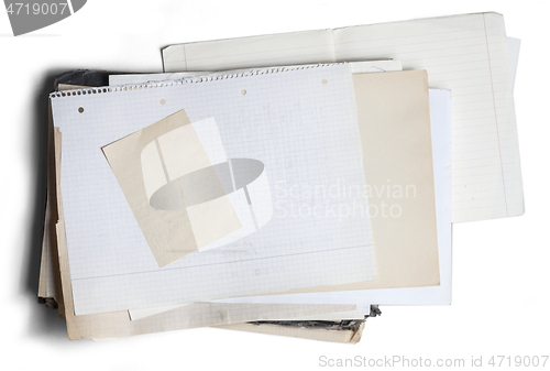 Image of Sheet of square paper on pile of aged papers