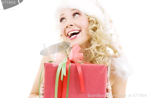 Image of cheerful santa helper girl with gift box