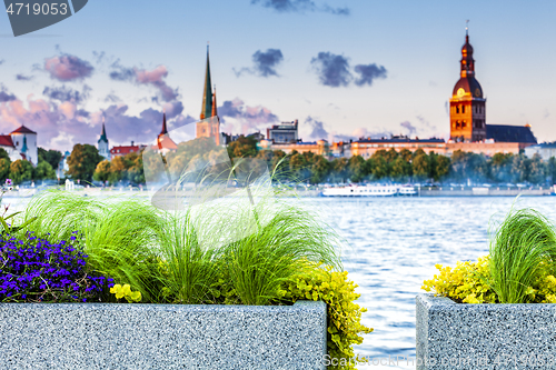Image of Urban flower pots with Riga old town skyline
