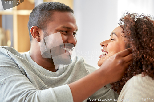 Image of happy african american couple at home