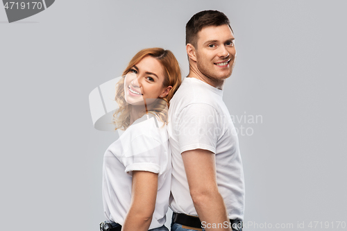 Image of portrait of happy couple in white t-shirts