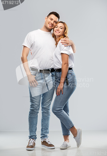 Image of portrait of happy couple in white t-shirts