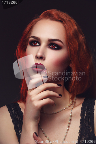 Image of Beautiful vampire young woman