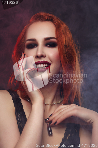 Image of Beautiful vampire young woman