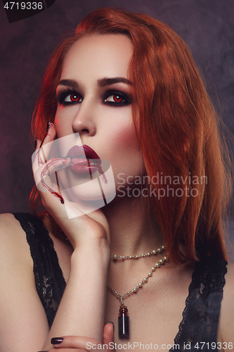 Image of Beautiful vampire young woman