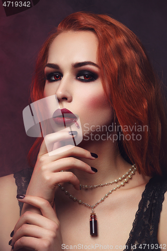 Image of Beautiful vampire young woman