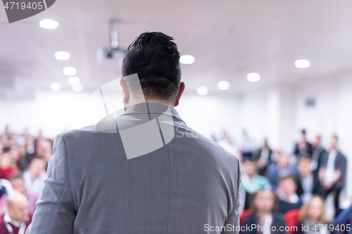 Image of businessman giving presentations at conference room