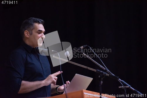 Image of businessman giving presentations at conference room