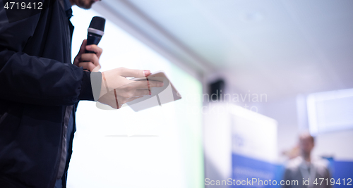 Image of businessman giving presentations at conference room