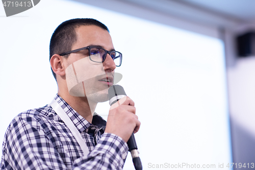 Image of businessman giving presentations at conference room