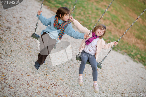 Image of kids swing in the park