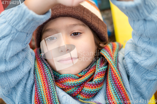 Image of cute little boy having fun in playground