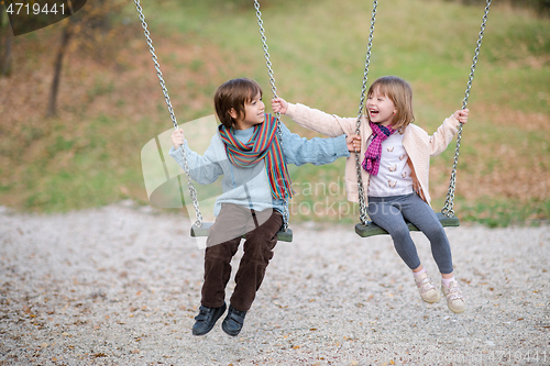 Image of kids swing in the park