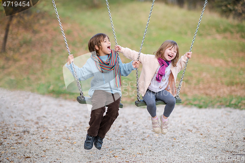 Image of kids swing in the park