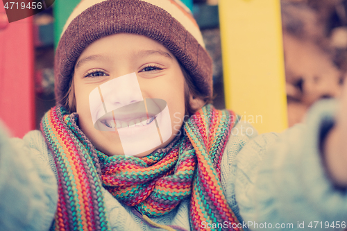 Image of cute little boy having fun in playground