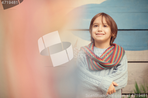 Image of cute little boy having fun in playground