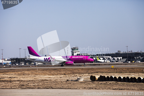 Image of Wizz Air Airbus after landing at Riga Airport.