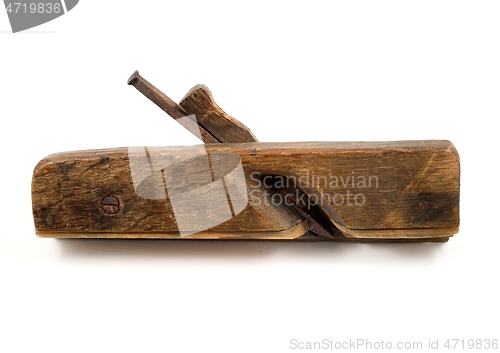 Image of old wooden plane with a rusty blade