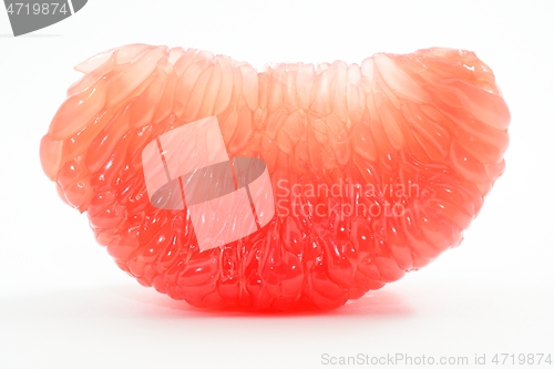 Image of juicy red grapefruit slice on a white 
