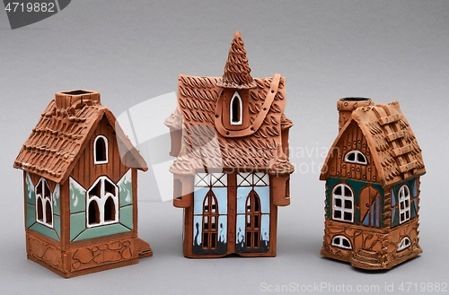 Image of traditional christmas ceramic houses on a gray background