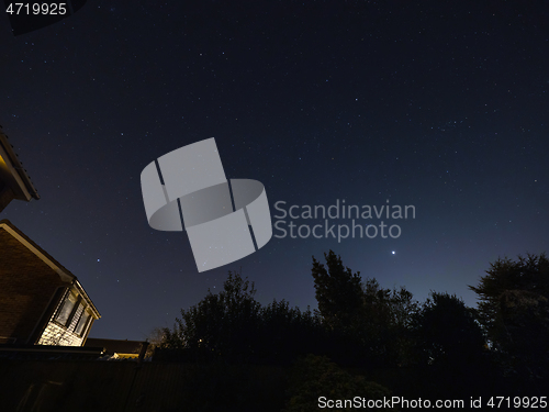 Image of Moon, Orion, Sirius and Venus in Night Sky