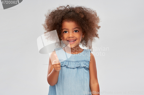Image of little african american girl showing thumbs up