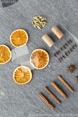 Image of dry orange, cinnamon, clove, anise and cardamom