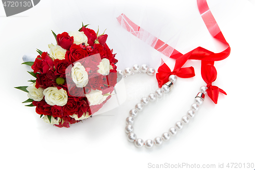 Image of bridal bouquet with red and white roses