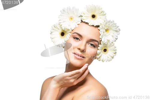 Image of beautiful girl with white flowers on head