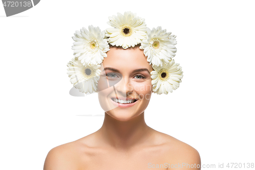 Image of beautiful girl with white flowers on head