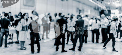 Image of Blured image of businesspeople at coffee break at conference meeting.