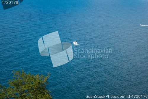 Image of Yachts on the Atlantic ocean, deep blue water and sky