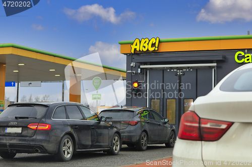 Image of Cars Waiting Outside Automatic Car Wash