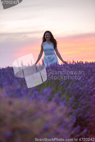 Image of woman portrait in lavender flower fiel