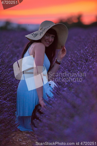 Image of woman portrait in lavender flower fiel