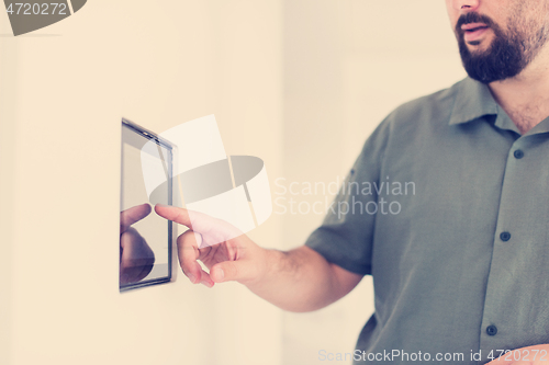 Image of smart home and technology concept close up of male hands