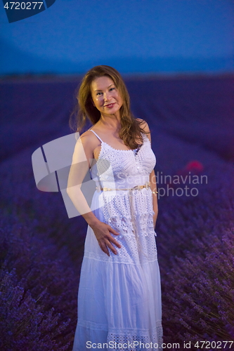 Image of portrait of and asian woman in lavender flower field