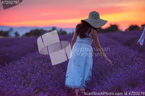 Image of woman portrait in lavender flower fiel