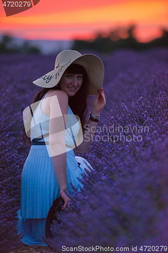 Image of woman portrait in lavender flower fiel