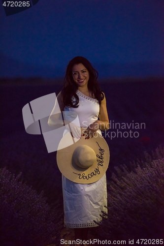 Image of woman portrait in lavender flower fiel