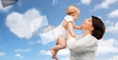 Image of happy middle-aged mother with little baby daughter