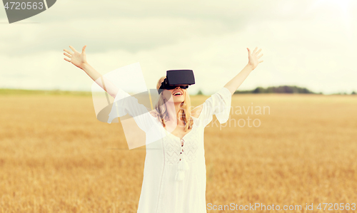 Image of woman in virtual reality headset on cereal field