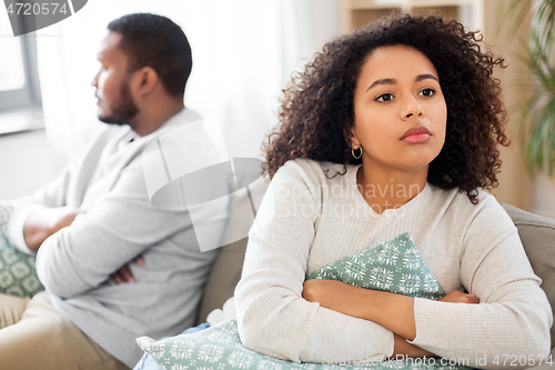 Image of unhappy couple having argument at home